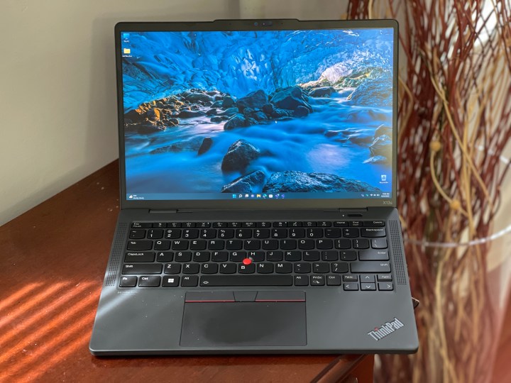 The ThinkPad X13s, open on a table.
