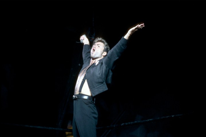 Photo of George Michael on stage.