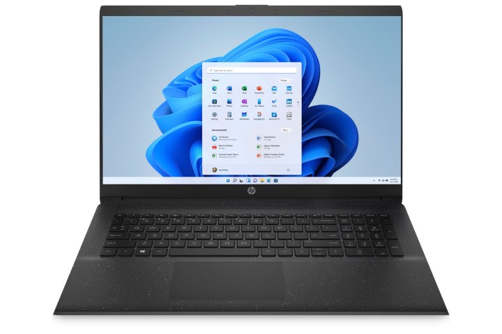 HP 17 laptop with Windows 11 interface on screen.