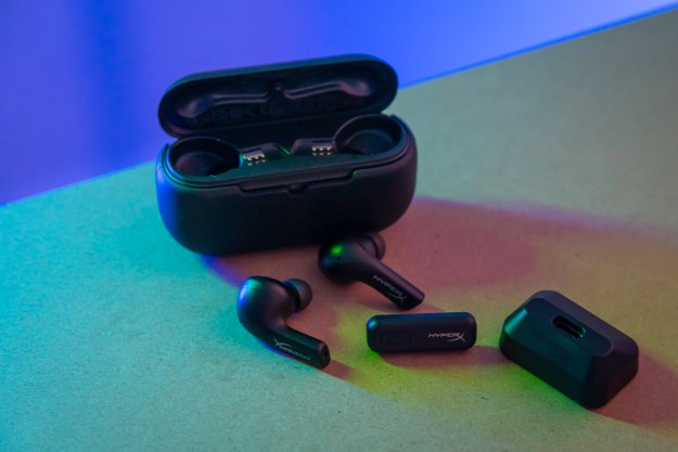 HyperX Cloud Mix earbuds and accessories sitting on a table.