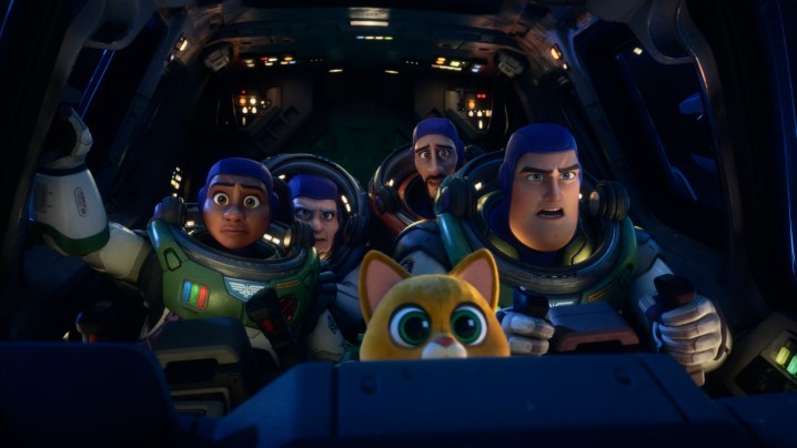 A view inside the cockpit of a crowded ship in Lightyear, with Buzz piloting it.