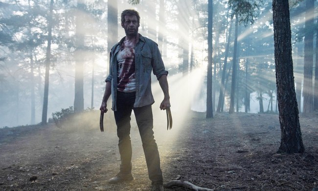 Hugh Jackman as Logan in forest in Logan.
