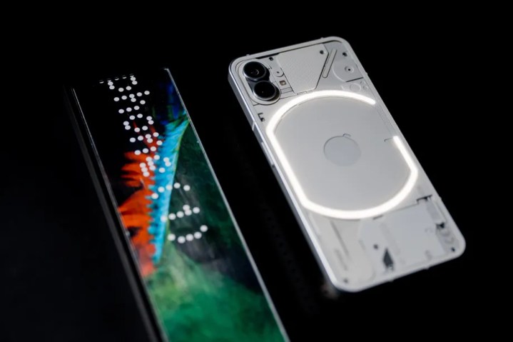 The back of the Nothing Phone 1, showing its transparent back and LEDs.