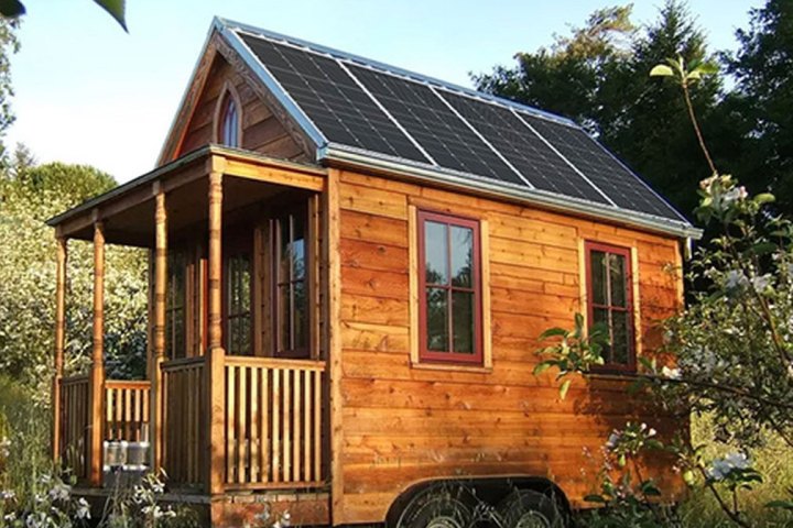 Solar panels installed on top of a tiny house. 