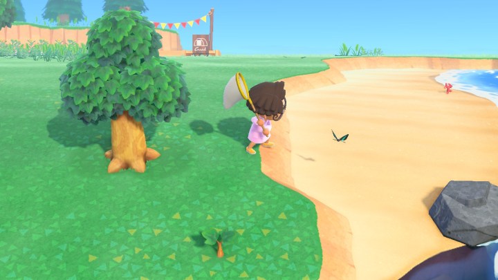 Holding a net in Animal Crossing: New Horizons.