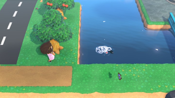 Villager holding fish in Animal Crossing: New Horizons.