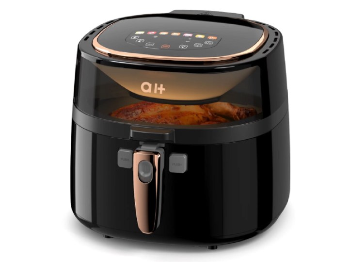 The Aukey Home 8 Quart Air Fryer with chicken cooking inside.