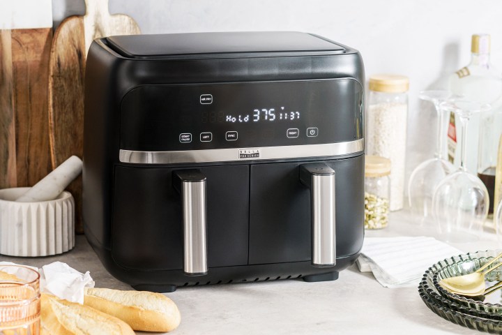 A Bella Pro Series 8-quart Digital Air Fryer sits on a kitchen counter.
