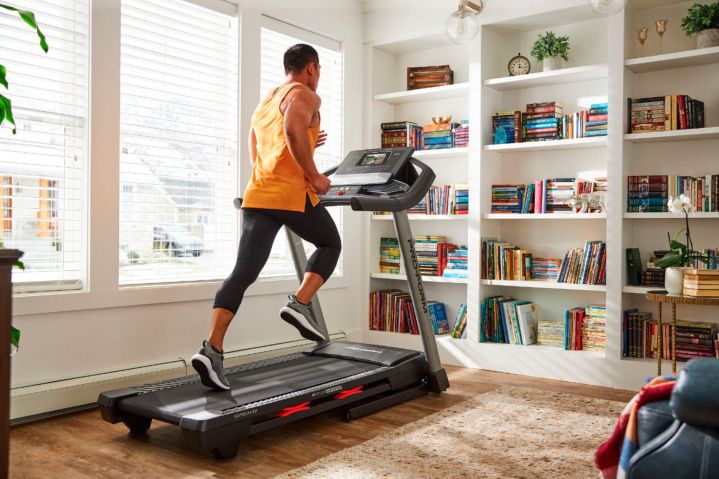 Man running on a ProForm Carbon T7 Treadmill.