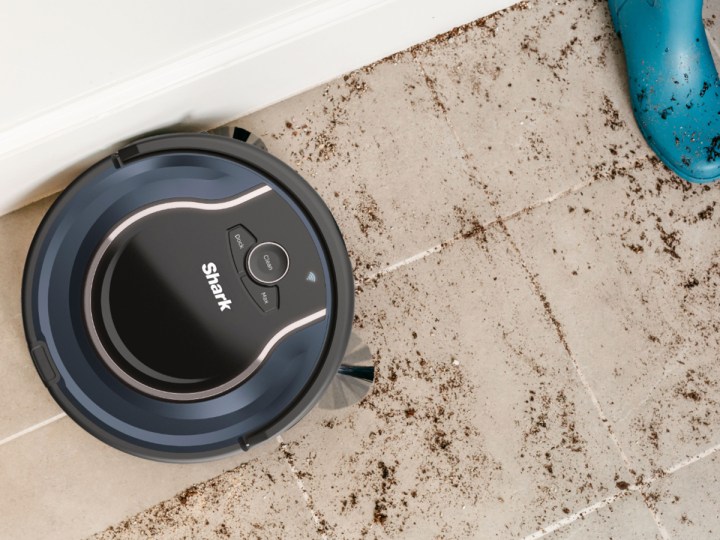 The Shark Ion RV761 Robot Vacuum cleaning a tile floor.
