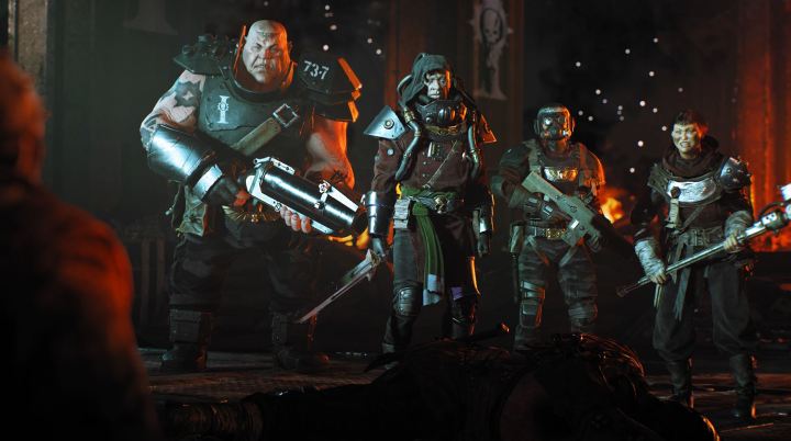 A team of players stands together in Warhammer 40K: Darktide.