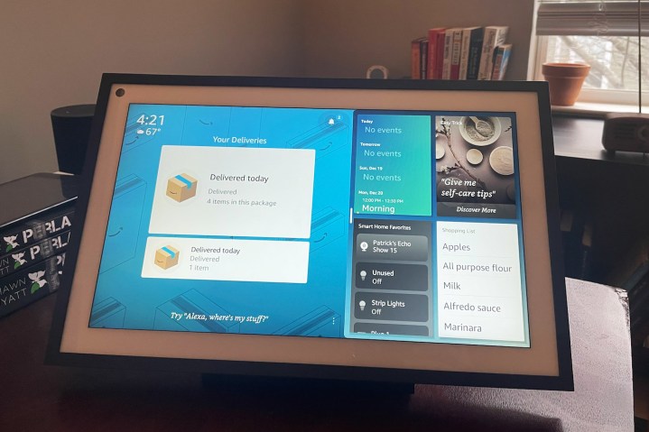 An Echo Show 15 device sits on a desk.