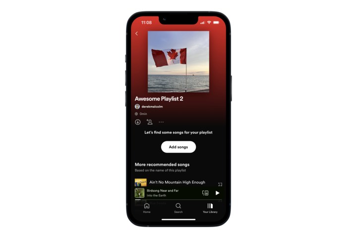The "Add Songs" button on Spotify mobile app.