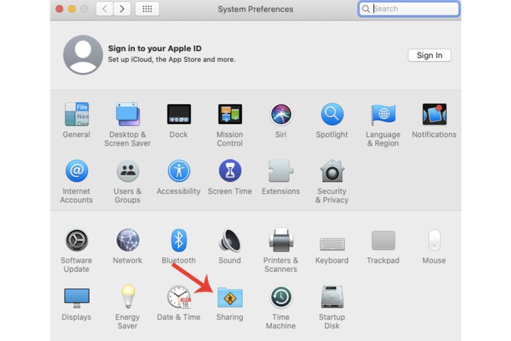 The Sharing option is highlighted in the System Preferences menu on a Mac.