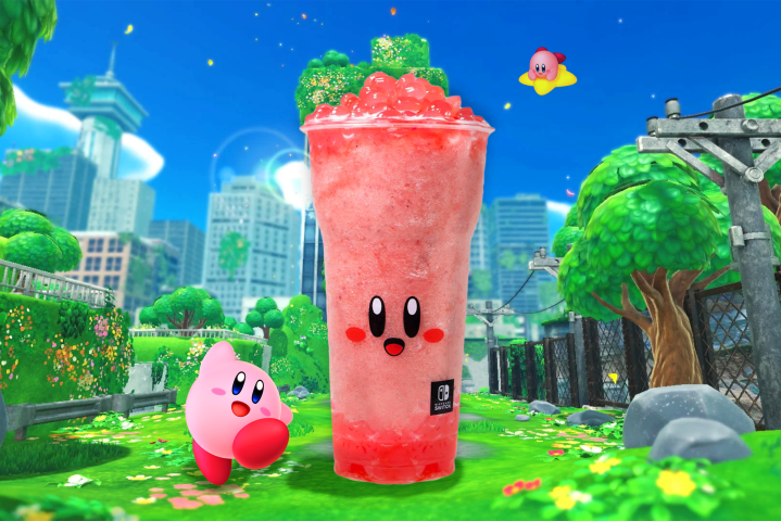 Kirby stands next to a massive Kirby Boba cup.