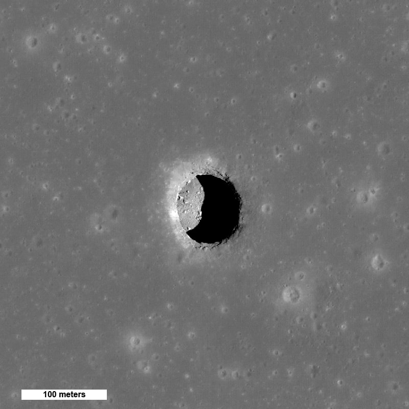 This is a spectacular high-Sun view of the Mare Tranquillitatis pit crater revealing boulders on an otherwise smooth floor. This image from LRO's Narrow Angle Camera is 400 meters (1,312 feet) wide, north is up.