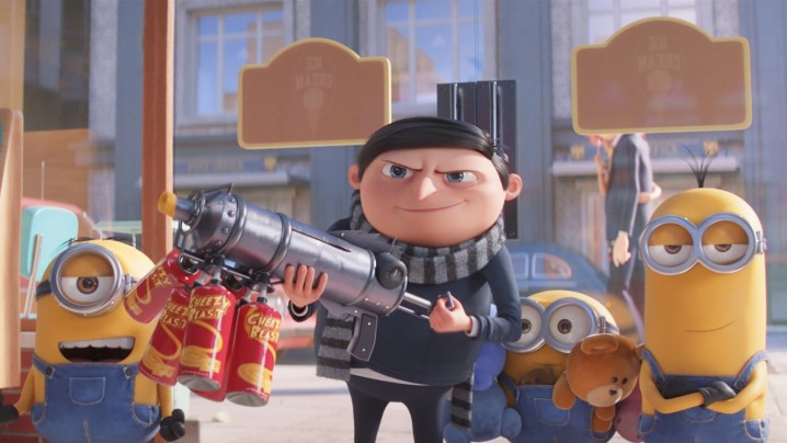 Gru is holding a cheese shotgun surrounded by his Minions.