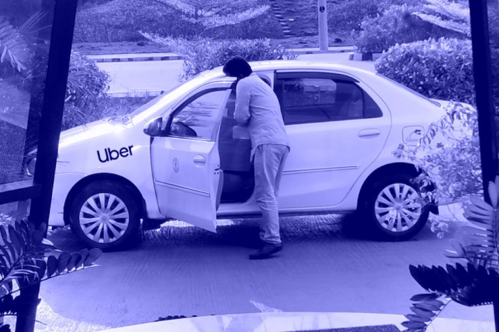an uber driver with his car