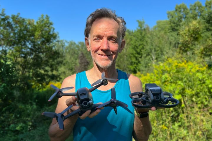 DJI Avata and DJI FPV side-by-side held by Alan Truly.