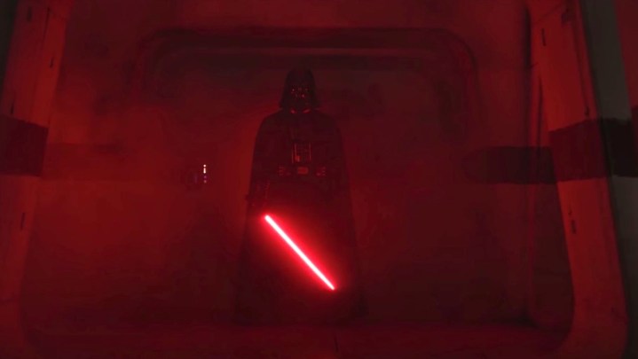 Darth Vader igniting his lightsaber and lighting the hall red in Rogue One.