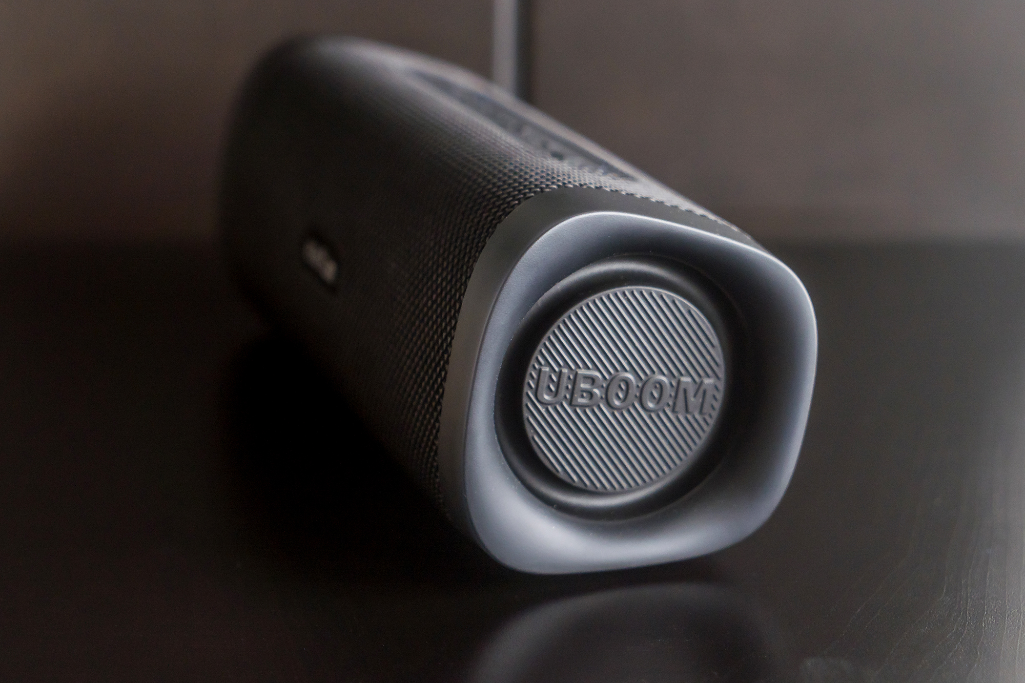 Closer view of the side of the EarFun UBoom L speaker.
