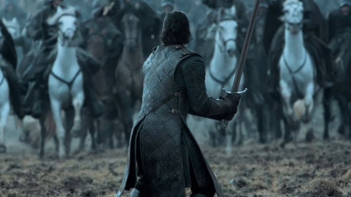 Jon Snow drawing his sword against Ramsay's army.