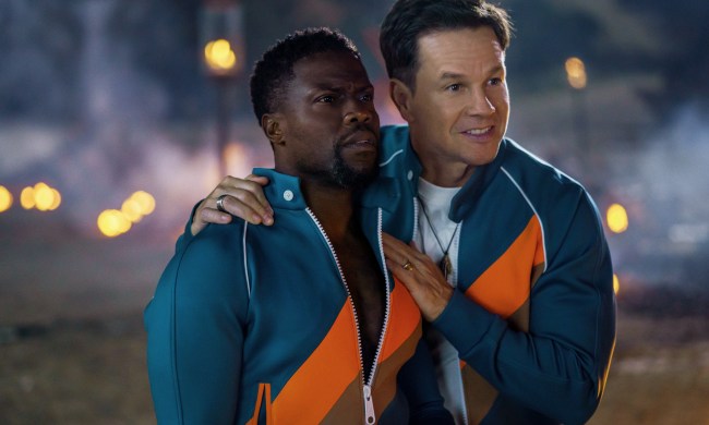 Kevin Hart and Mark Wahlberg wear matching tracksuits in Netflix's Me Time.