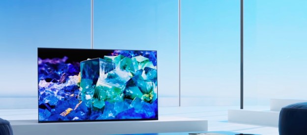 A Sony Bravia A80K 4K TV sits on a table in front of a large window.