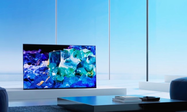 A Sony Bravia A80K 4K TV sits on a table in front of a large window.