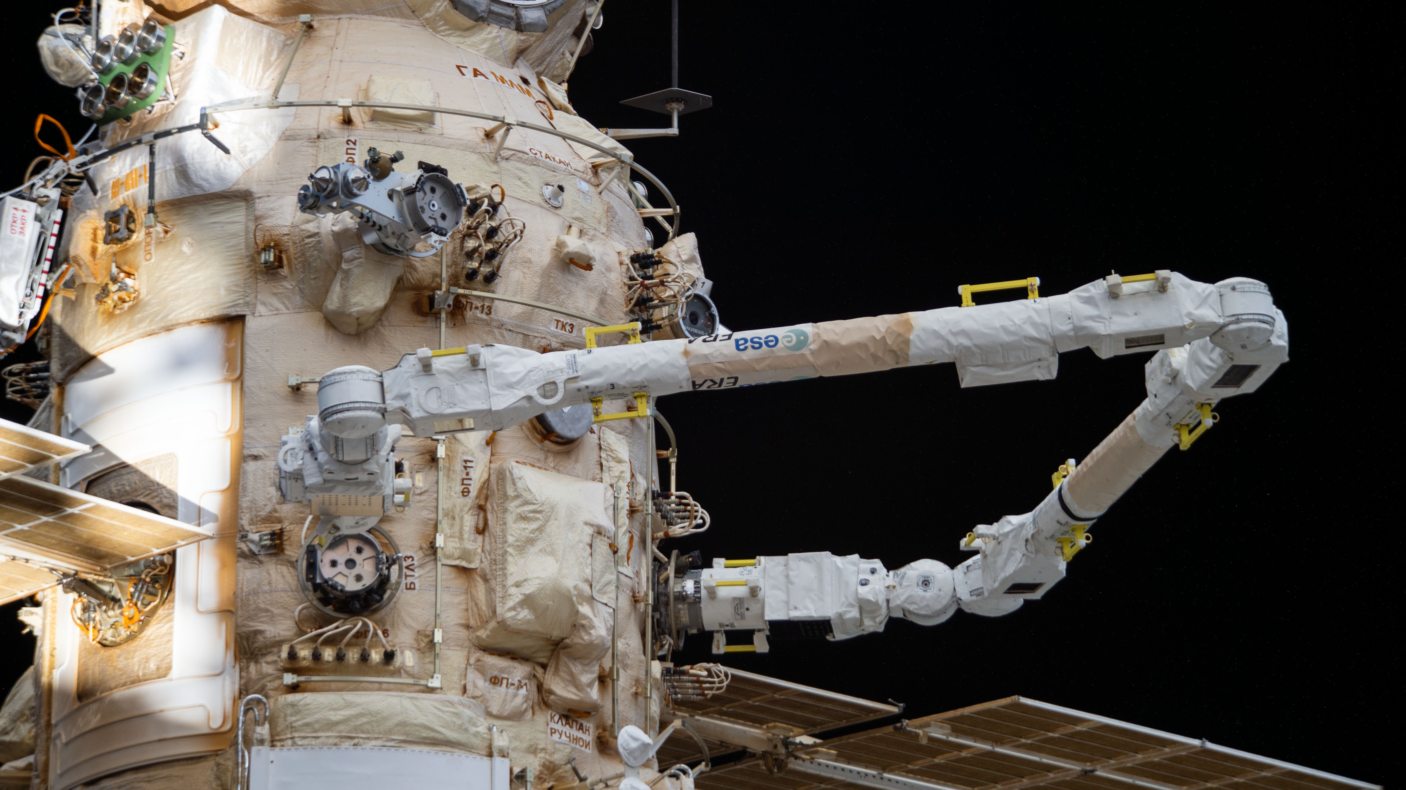 The European robotic arm extends out from the Nauka module