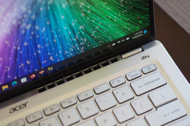 The Acer Swift 3 OLED top-down view features a power button and air vents.