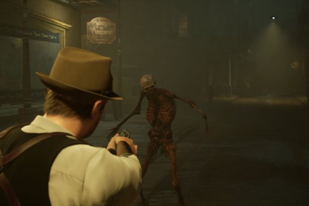 Een man schiet een zombie alleen in het donker