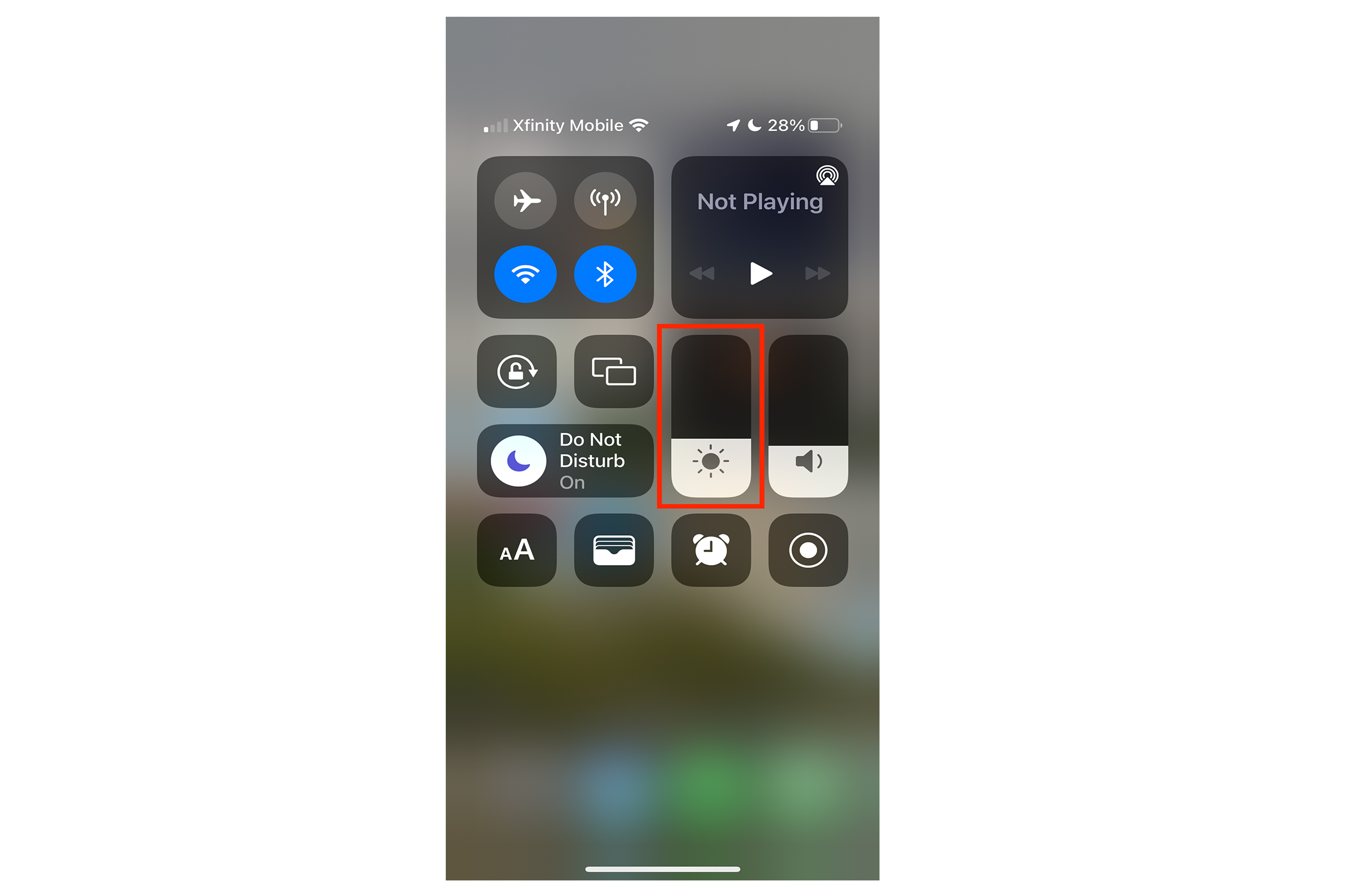 Controle deslizante de brilho do Centro de Controle do iOS.
