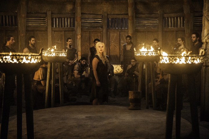 Dany stands in front of a council in Game of Thrones.