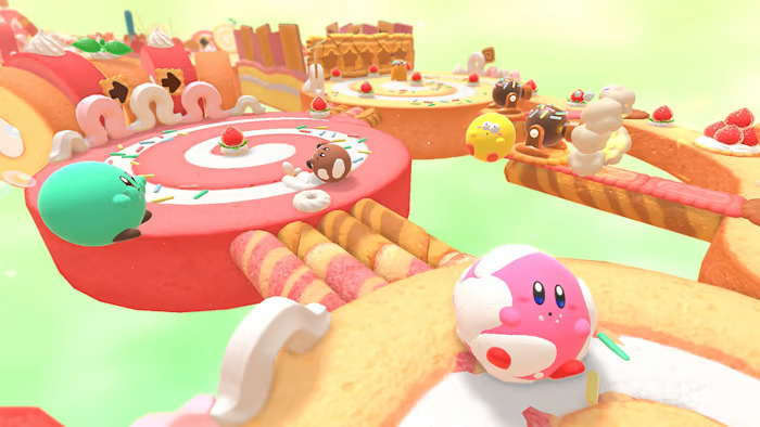 Kirby rolls through an icea cream course in Kirby's Dream Buffet.