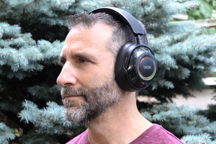 Side view of man wearing Mark Levinson No. 5909 headphones