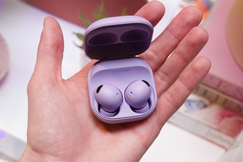 Samsung Galaxy Buds 2 Pro in the palm of a hand.