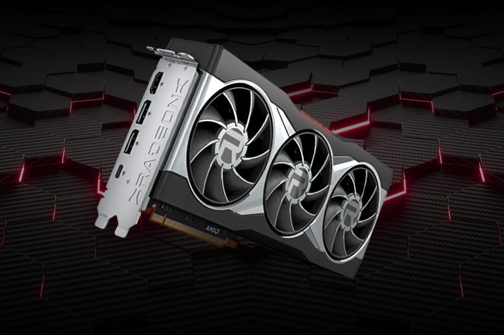 La tarjeta gráfica AMD Radeon RX 6900 se cierne sobre un fondo rojo y negro de AMD.