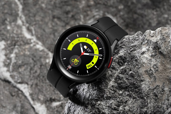 The Samsung Galaxy Watch 5 Pro resting on a rock.
