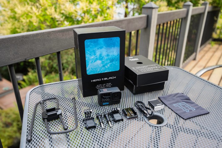 The GoPro Hero 11 Black unboxed with accessories.