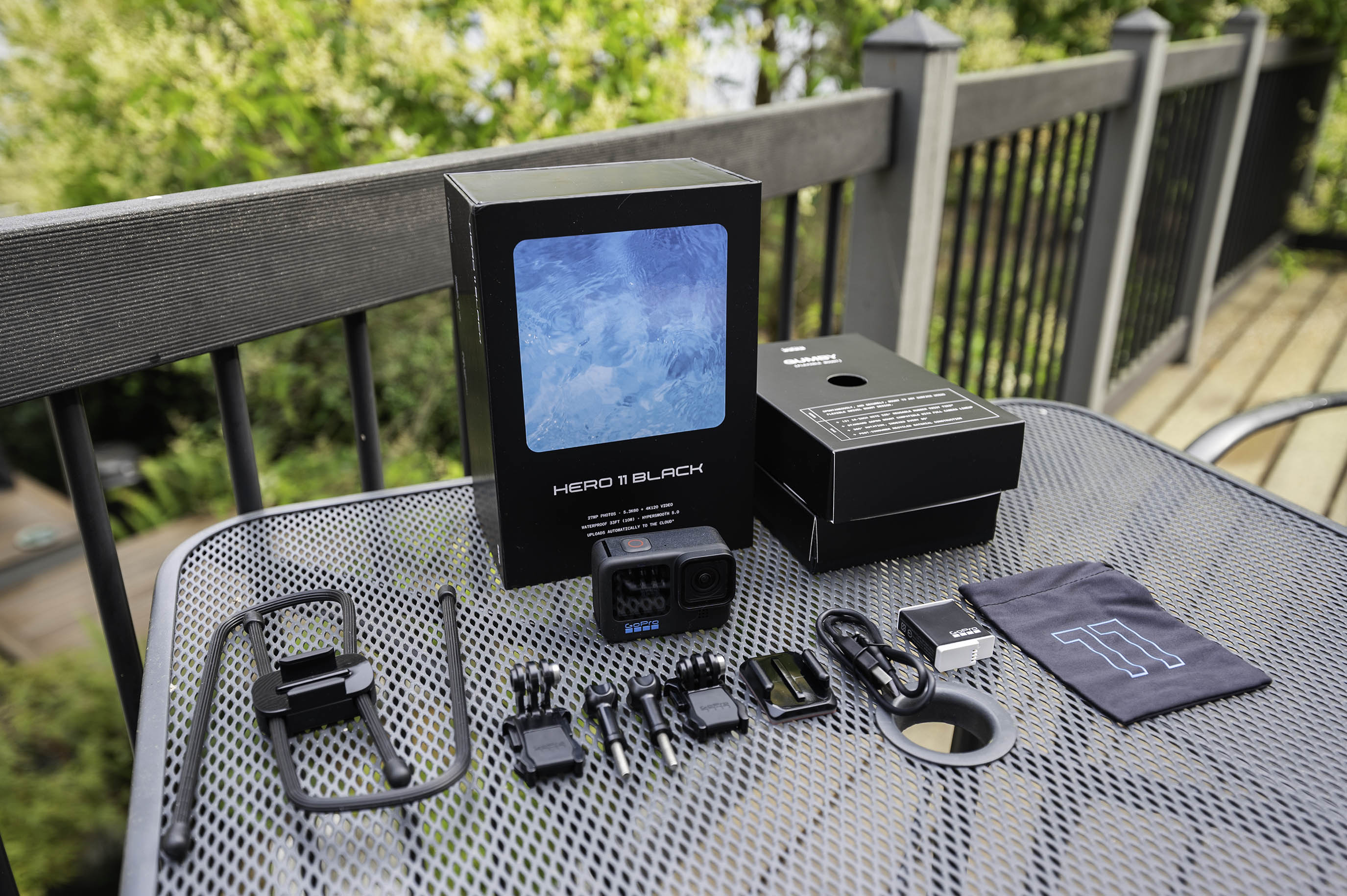 The GoPro Hero 11 Black unboxed with accessories.