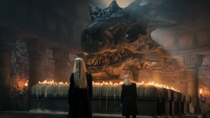 Rhaenyra with her father Viserys in front of Balerion's skull.
