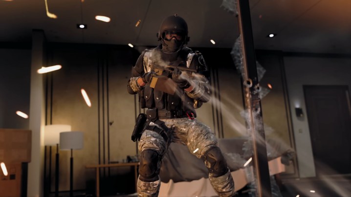Third-person view of character shooting in Modern Warfare II.