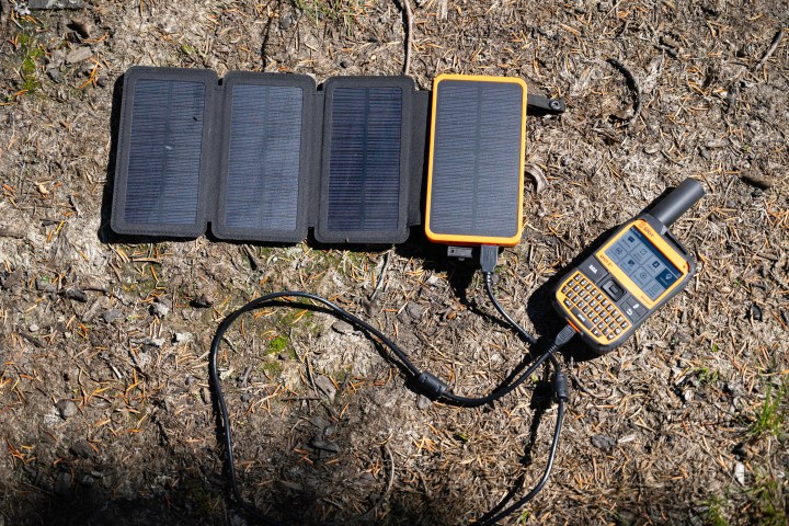 A solar powered battery charging the Spot X.