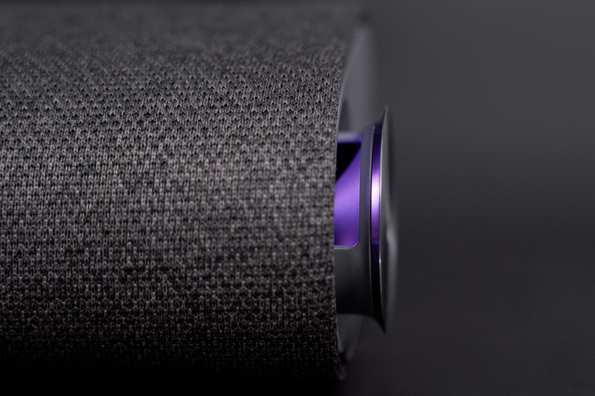 Close up view of the fabric covering on the Vizio M-Series Elevate Soundbar (M512E-K6).