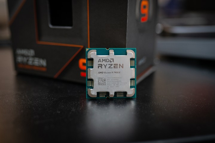 The Ryzen 9 7950X sitting against its box.
