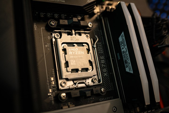 The Ryzen 9 7950X socketed into a motherboard.