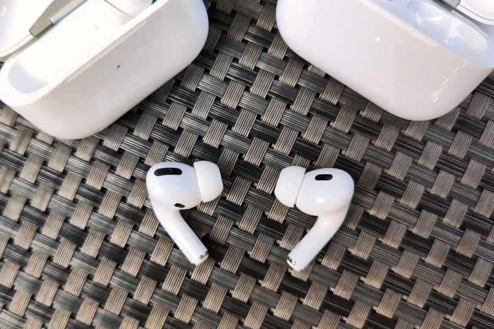 Apple AirPods Pro 2 next to the first generation AirPods Pro.