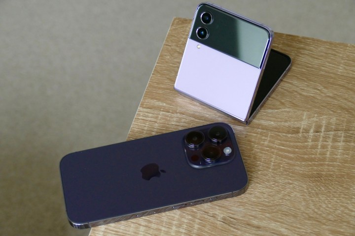 iPhone 14 Pro and Galaxy Z Flip 4 seen from the back.