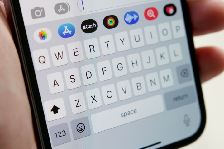 A keyboard on an iPhone running iOS 16.